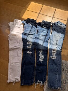 American Eagle Outfitters Dark Blue Distressed Skinny Jeans Pair